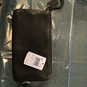 Coach leather double zipper wallet.